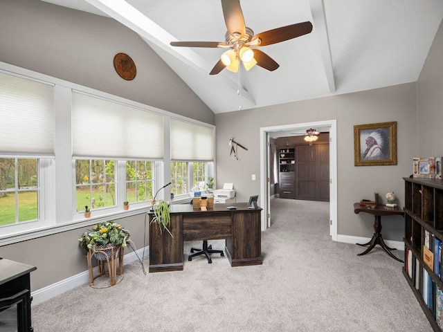 office featuring carpet flooring, lofted ceiling with beams, a ceiling fan, and baseboards
