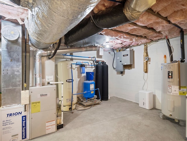 unfinished basement featuring heating unit, electric water heater, electric panel, water heater, and concrete block wall