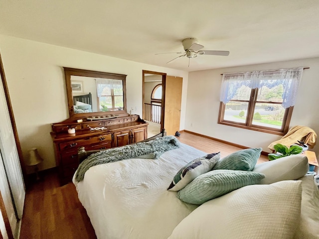 bedroom featuring ceiling fan and wood finished floors