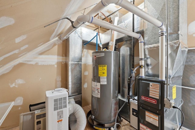 utility room featuring water heater and heating unit