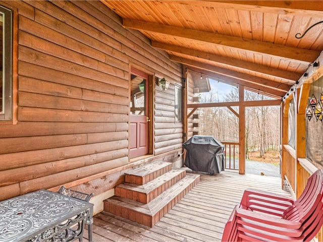 wooden terrace with grilling area