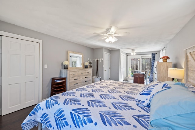 bedroom with a ceiling fan and dark wood-style floors