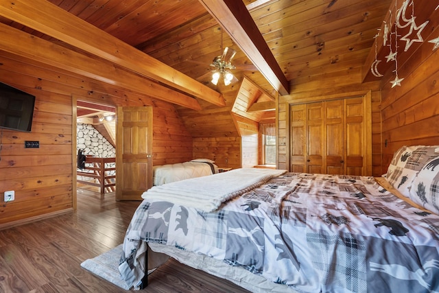 93 Roller Coaster Rd, Laconia, NH 03246 - bedroom with wood walls, beam ceiling, wood finished floors, wood ceiling, and a closet