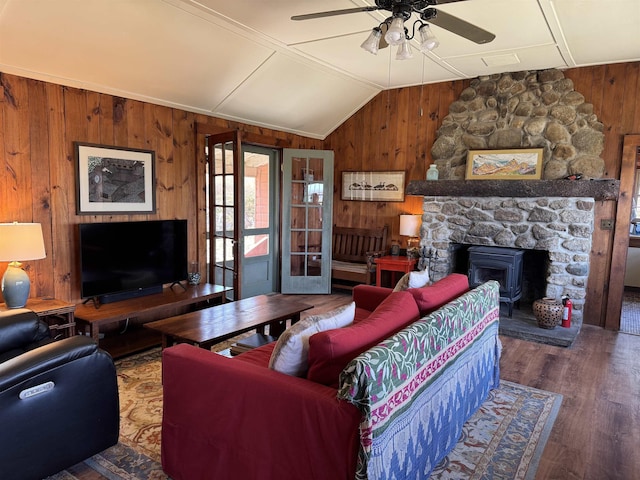 60 Effingham Rd, Ossipee, NH 03864 - living room featuring wood walls, a ceiling fan, vaulted ceiling, and wood finished floors
