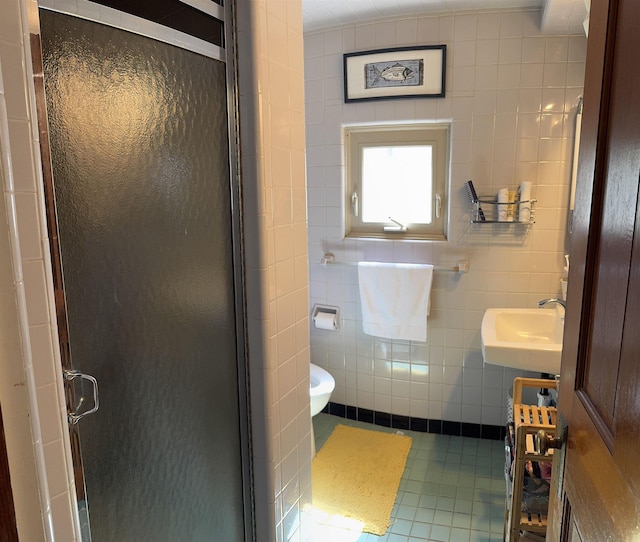 60 Effingham Rd, Ossipee, NH 03864 - full bathroom with a sink, a stall shower, tile patterned floors, toilet, and tile walls