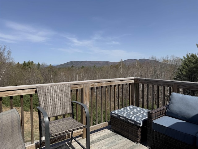60 Effingham Rd, Ossipee, NH 03864 - wooden deck with a mountain view