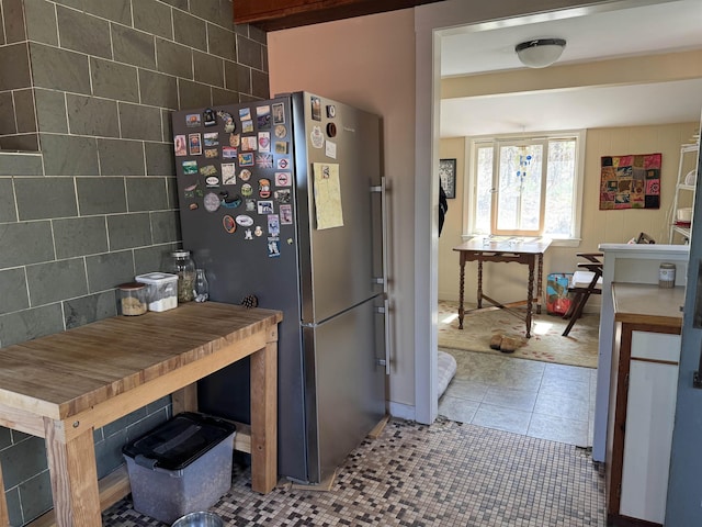 60 Effingham Rd, Ossipee, NH 03864 - kitchen featuring freestanding refrigerator, tile patterned flooring, and tile walls
