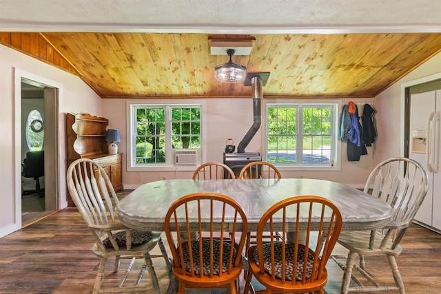 dining room with lofted ceiling, wood ceiling, plenty of natural light, dark wood-style floors, and baseboards