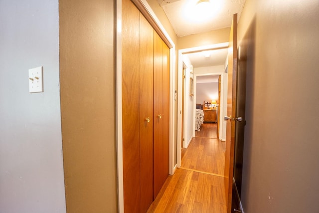 hallway featuring light wood-type flooring