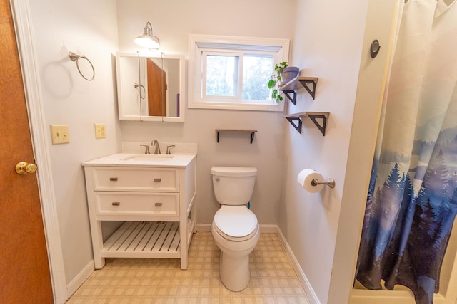 bathroom with tile patterned floors, toilet, a shower with shower curtain, and vanity