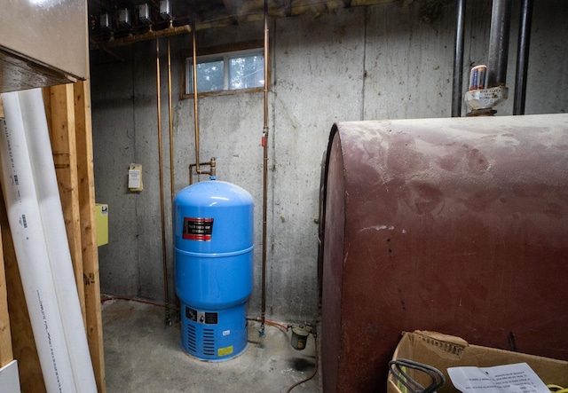 utility room featuring heating fuel