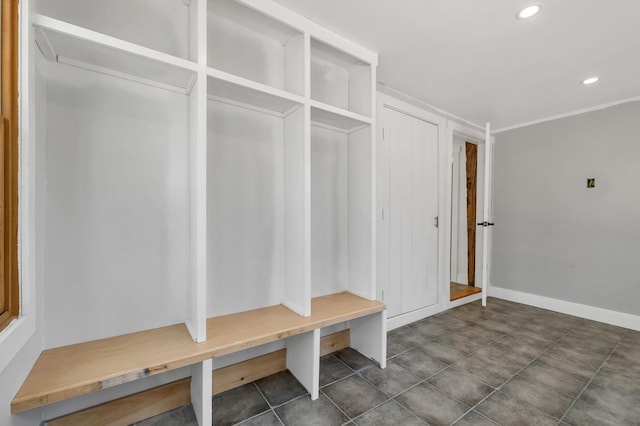 mudroom featuring recessed lighting and baseboards