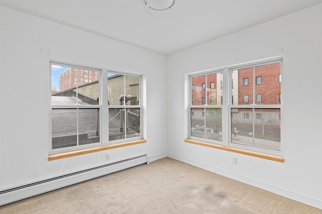 193 St Paul St Unit 101, Burlington, VT 05401 - unfurnished room with a baseboard heating unit, carpet floors, and baseboards