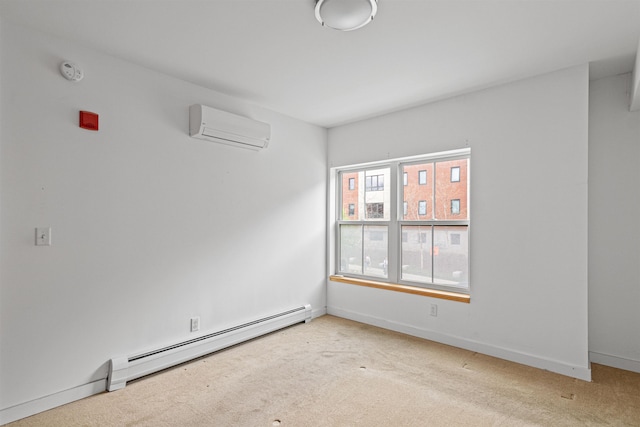 193 St Paul St Unit 101, Burlington, VT 05401 - spare room with baseboard heating, a wall mounted AC, and light colored carpet