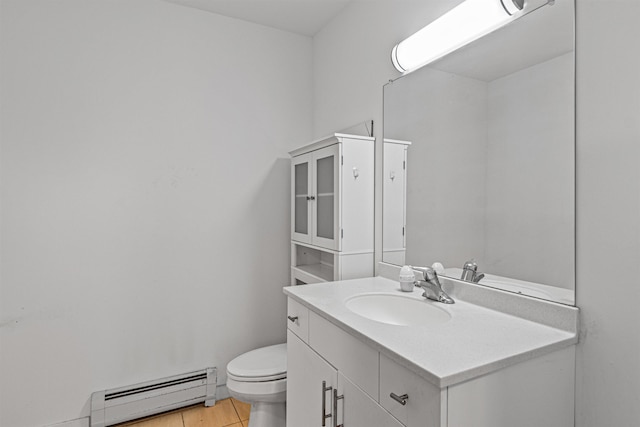 193 St Paul St Unit 101, Burlington, VT 05401 - half bathroom with a baseboard heating unit, vanity, and toilet