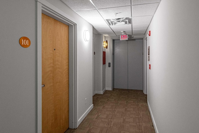 193 St Paul St Unit 101, Burlington, VT 05401 - hall featuring baseboards and a paneled ceiling