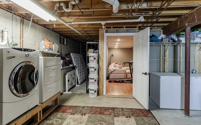 washroom featuring independent washer and dryer