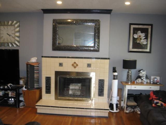 25 Centerview Dr, Swanzey, NH 03446 - living room featuring wood finished floors, a tiled fireplace, and recessed lighting