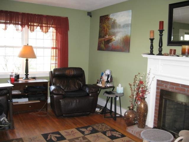 25 Centerview Dr, Swanzey, NH 03446 - living room featuring a fireplace and wood finished floors