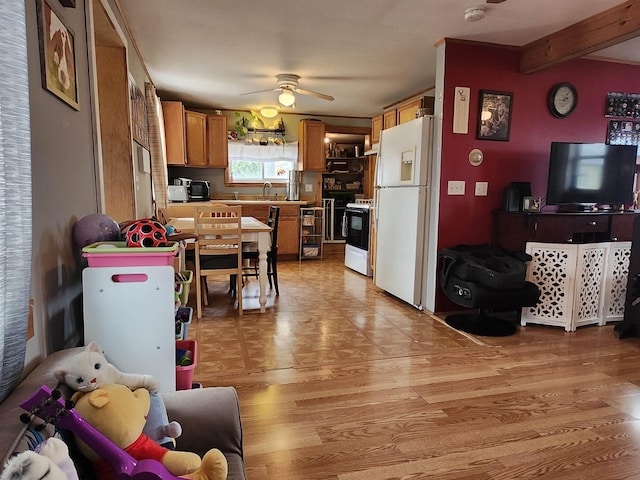 kitchen with white refrigerator with ice dispenser, electric stove, brown cabinetry, a ceiling fan, and light wood-style floors