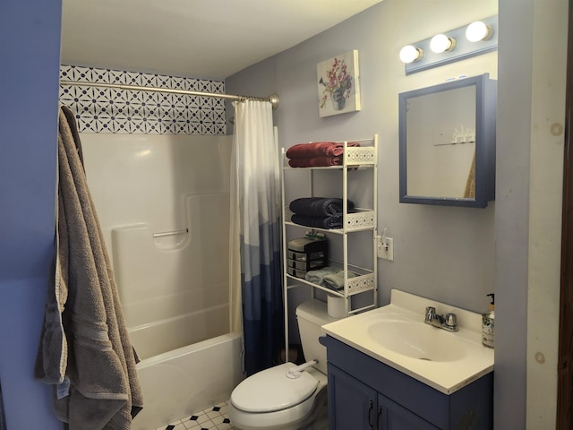bathroom featuring toilet, vanity, and shower / bath combo with shower curtain
