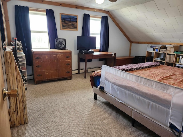 carpeted bedroom with lofted ceiling and baseboard heating