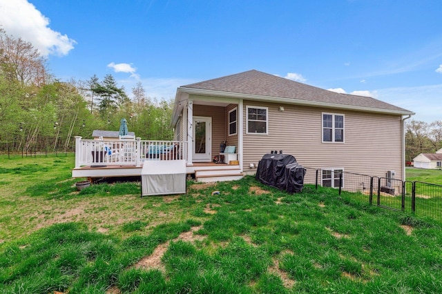 11 Carriage Hill Rd, Wilton, NH 03086 - rear view of house featuring a wooden deck