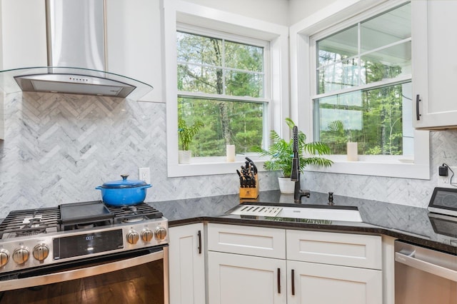 11 Carriage Hill Rd, Wilton, NH 03086 - kitchen featuring stainless steel appliances, island exhaust hood, backsplash, and a sink