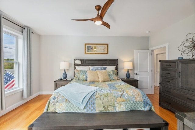 11 Carriage Hill Rd, Wilton, NH 03086 - bedroom with light wood-style floors, a ceiling fan, and baseboards