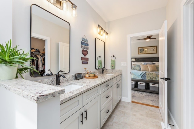 11 Carriage Hill Rd, Wilton, NH 03086 - ensuite bathroom with double vanity and baseboards