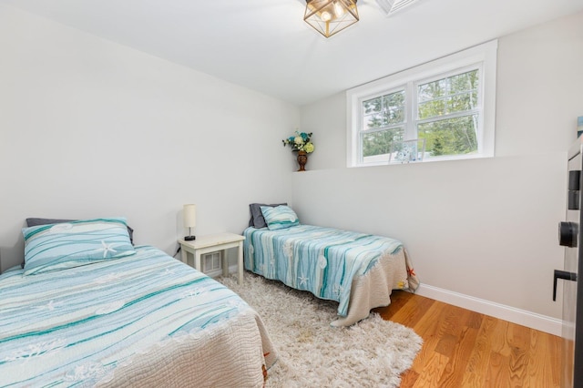 11 Carriage Hill Rd, Wilton, NH 03086 - bedroom with light wood finished floors and baseboards