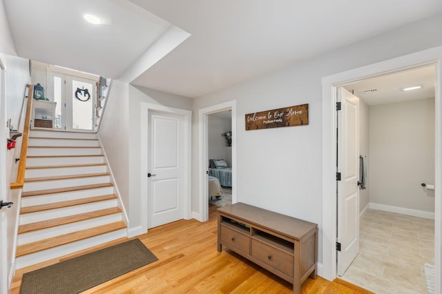 11 Carriage Hill Rd, Wilton, NH 03086 - staircase featuring baseboards