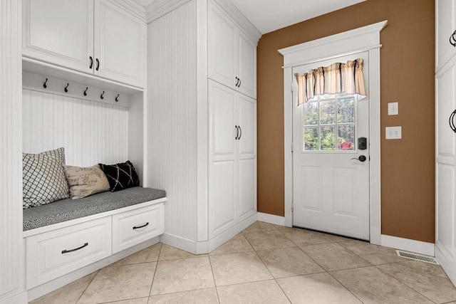 12 Mcintosh Ln, Bedford, NH 03110 - mudroom with baseboards and light tile patterned flooring