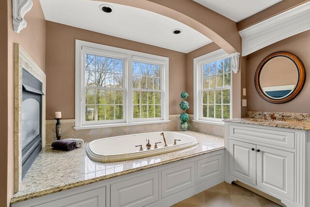 12 Mcintosh Ln, Bedford, NH 03110 - full bath featuring a bath and vanity