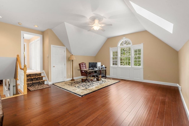 12 Mcintosh Ln, Bedford, NH 03110 - office space with wood-type flooring, a skylight, a ceiling fan, baseboards, and vaulted ceiling