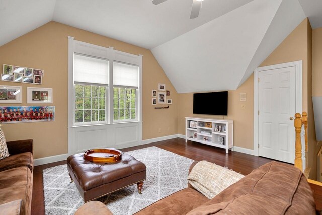 12 Mcintosh Ln, Bedford, NH 03110 - living room with lofted ceiling, baseboards, dark wood-style floors, and ceiling fan