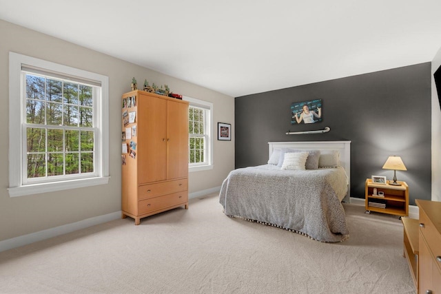 12 Mcintosh Ln, Bedford, NH 03110 - bedroom with light colored carpet and baseboards
