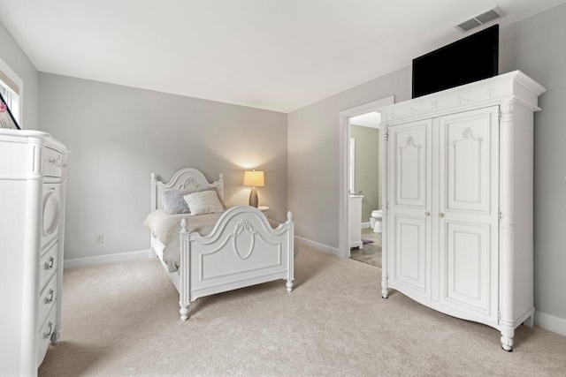 12 Mcintosh Ln, Bedford, NH 03110 - bedroom with light carpet, baseboards, and ensuite bath