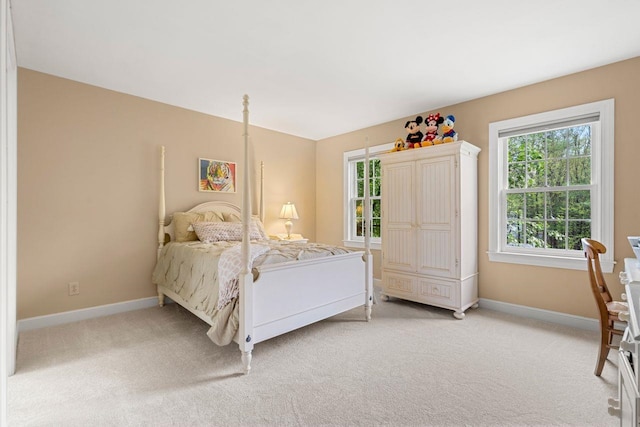 12 Mcintosh Ln, Bedford, NH 03110 - bedroom featuring light colored carpet and baseboards
