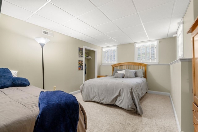 12 Mcintosh Ln, Bedford, NH 03110 - bedroom with a drop ceiling, baseboards, and carpet floors