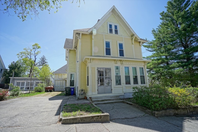 489 Hanover St, Manchester, NH 03104 - rear view of property featuring entry steps