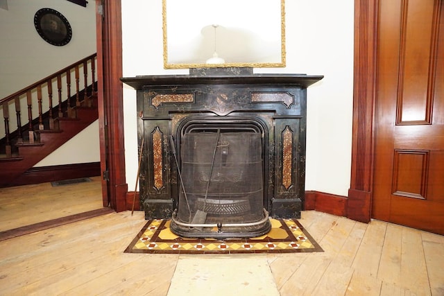 489 Hanover St, Manchester, NH 03104 - detailed view of wood finished floors and baseboards