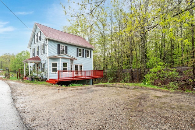 28 Putnam Hill Rd, Lyndeborough, NH 03082 - view of side of home with a deck and roof with shingles
