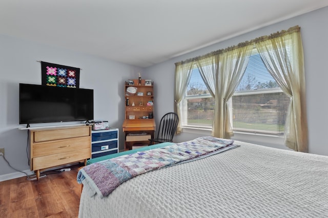 15 Garys Dr, Littleton, NH 03561 - bedroom featuring dark wood finished floors and baseboards