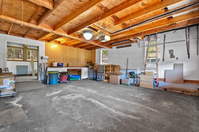 15 Garys Dr, Littleton, NH 03561 - garage featuring a garage door opener