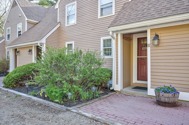 45 Haynesville Ave Unit 3, Conway, NH 03818 - view of exterior entry featuring roof with shingles