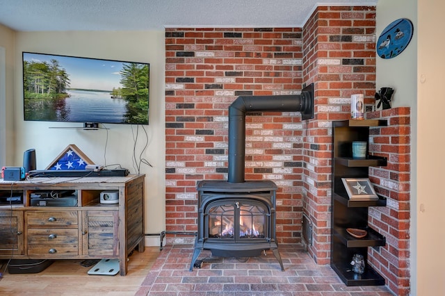 45 Haynesville Ave Unit 3, Conway, NH 03818 - detailed view of a wood stove and wood finished floors
