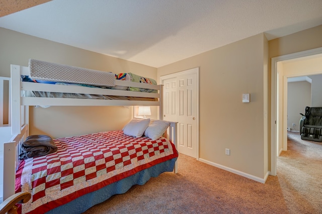 45 Haynesville Ave Unit 3, Conway, NH 03818 - carpeted bedroom featuring a closet and baseboards