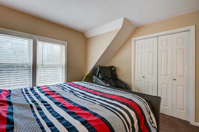 45 Haynesville Ave Unit 3, Conway, NH 03818 - bedroom featuring carpet flooring, a closet, and a textured ceiling