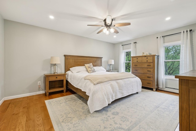 bedroom with light wood-style floors, baseboards, a ceiling fan, and recessed lighting